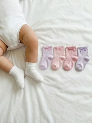 Skarpetki z ozdobną kokardą 5 pack - wielobarwny. Skarpety Sinsay, bez wzorów. Za 15.99 zł.