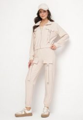 Jasnobeżowy Komplet Dresowy Bluza Rozpinana i Spodnie Slim w Stylu Utility Telavienna. Brązowe bluzy Born2be, m, bez wzorów, z dresówki, bez kaptura. Za 84.99 zł.