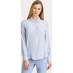 JEDWABNA KOSZULA DALMINE Weekend Max Mara. Niebieskie koszule Weekend Max Mara, bez wzorów, z jedwabiu, bez kołnierzyka, bez ramiączek. Za 599.40 zł.