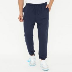 Spodnie sportowe unisex F BALLON niebieskie. Niebieskie obuwie sportowe LEGEA, bez wzorów, z gumy, na fitness i siłownię. W wyprzedaży za 92.00 zł.