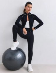 Damskie legginsy kontrastowe, wysoki stan, squat proof, Sense czarne. Czarne legginsy AIM'N, m, bez wzorów, z materiału, z podwyższonym stanem, długie. Za 346.00 zł.
