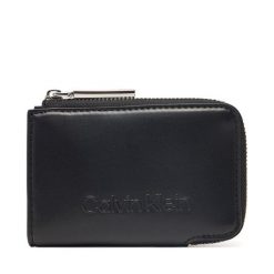 Portfel damski Calvin Klein. Czarne portfele Calvin Klein, bez wzorów. Za 149.99 zł.