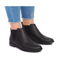 Czarne Botki Z Gumką 951-PA Czarny. Czarne botki ButyModne, bez wzorów, bez obcasa, bez zapięcia. Za 89.00 zł.