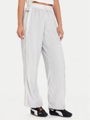 Puma Spodnie dresowe PUMA X ROSÉ T7 633796 32 Srebrny Relaxed Fit. Szare spodnie dresowe Puma, xl, bez wzorów, z dresówki. Za 479.99 zł.
