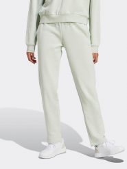 Adidas Spodnie dresowe w kolorze jasnozielonym rozmiar: XL. Zielone spodnie dresowe Adidas, xl, bez wzorów, z dresówki. Za 149.66 zł.