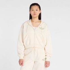 Bluza damska New Balance WJ53509PEF – beżowa. Brązowe bluzy New Balance, m, bez wzorów, z bawełny, z kapturem. Za 329.99 zł.