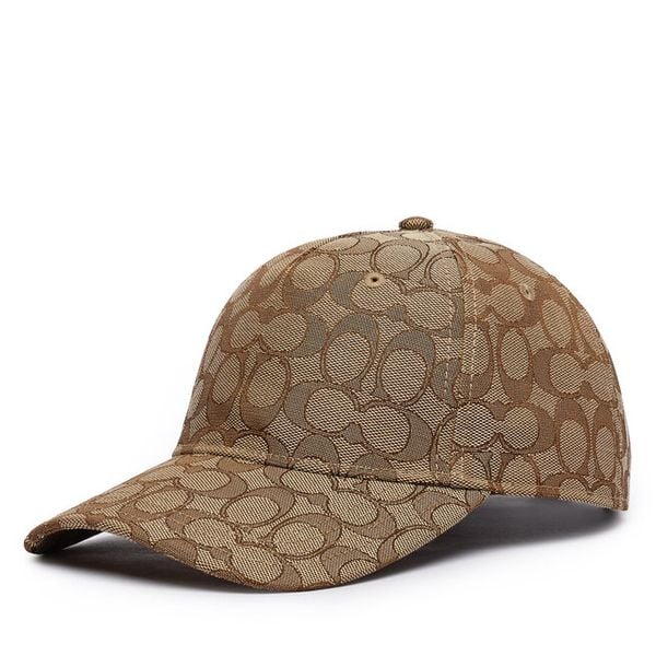 Czapka z daszkiem Coach. Brązowe czapki Coach, bez wzorów. Za 303.99 zł.
