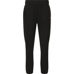 Damskie spodnie dresowe Athlecia Jillnana V2. Czarne spodnie dresowe Athlecia, bez wzorów, z dresówki. Za 253.00 zł.