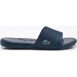 Lacoste - Klapki. Niebieskie klapki Lacoste, bez wzorów, z gumy, bez obcasa, na obcasie. W wyprzedaży za 89.90 zł.
