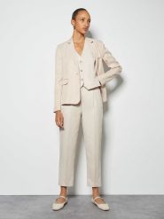 Someday Spodnie w kolorze kremowym rozmiar: 42. Brązowe spodnie materiałowe someday., na co dzień, bez wzorów, z materiału. Za 260.95 zł.