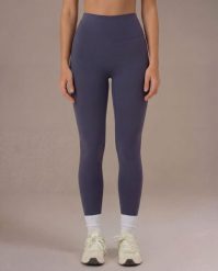 Legginsy Motion - Szaroniebieski. Niebieskie legginsy JOY STUDIO, s, bez wzorów, z materiału, z podwyższonym stanem, do biegania. Za 199.00 zł.