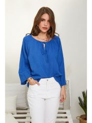 Rodier Lin Lniana bluzka w kolorze niebieskim rozmiar: M/L. Niebieskie bluzki Rodier Lin, l, bez wzorów, ze lnu, bez kołnierzyka, bez ramiączek. Za 95.01 zł.