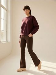 Bawełniane legginsy flare w prążek - brązowy. Brązowe legginsy sportowe Sinsay, l, bez wzorów, z bawełny. Za 35.99 zł.
