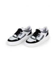 Anna Morellini Skórzane sneakersy "Ludia" w kolorze biało-czarnym rozmiar: 39. Białe trampki Anna Morellini, bez wzorów, bez zapięcia. Za 325.03 zł.
