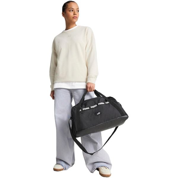 Torba Puma Phase Tape Small Sports Bag Bl 22L. Czarne torby na ramię Puma, bez wzorów, z materiału, na ramię, bez dodatków. Za 190.00 zł.