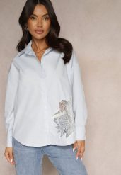 Niebieska Koszula z Bawełny Ozdobiona Ażurową Wstawką Donivessa. Niebieskie koszule Renee, l, w ażurowe wzory, z bawełny, eleganckie, bez kołnierzyka, bez ramiączek. Za 54.99 zł.