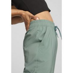 Damskie spodnie LACE PUMA Green Moon. Zielone spodnie sportowe Puma, s, bez wzorów, z podwyższonym stanem, na jogę i pilates. W wyprzedaży za 207.60 zł.