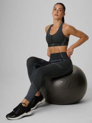 4F Legginsy treningowe bezszwowe damskie - czarne M/L. Czarne legginsy 4f, l, bez wzorów, z materiału, z podwyższonym stanem, na fitness i siłownię. Za 149.99 zł.