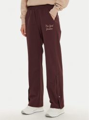 Champion Spodnie dresowe 117511 Brązowy Wide Leg. Brązowe spodnie dresowe Champion, m, bez wzorów, z dresówki. Za 199.99 zł.