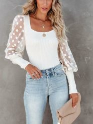 LA Angels Bluzka w kolorze białym rozmiar: M. Białe bluzki LA Angels, m, bez wzorów, z tiulu, bez kołnierzyka, bez ramiączek. Za 113.99 zł.