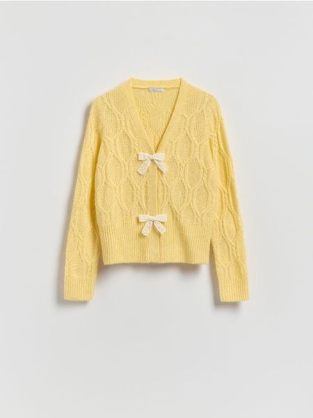 Kardigan z kokardkami - żółty. Żółte kardigany Reserved, l, bez wzorów, z dzianiny. Za 129.99 zł.
