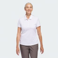 Koszulka polo Women's Solid Performance Short Sleeve. Białe koszulki polo Adidas, l, bez wzorów, z materiału, bez kołnierzyka, bez ramiączek. Za 229.00 zł.