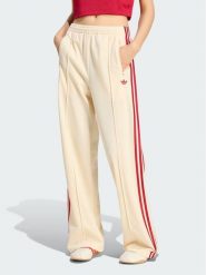 Adidas Spodnie dresowe 159027 Żółty Loose Fit. Żółte spodnie dresowe Adidas, xl, bez wzorów, z dresówki. Za 298.99 zł.