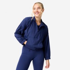 Bluza sportowa damska Domyos. Niebieskie bluzy DOMYOS, s, bez wzorów, z elastanu, bez kaptura. Za 159.99 zł.