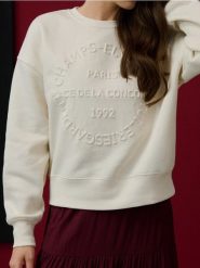 Bluza crewneck oversize z napisem - kremowy. Białe bluzy Sinsay, l, bez wzorów, bez kaptura. Za 45.99 zł.