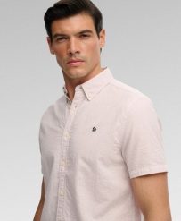 Superdry Klasyczna koszula seersucker z krótkim rękawem — 100% bawełna. Białe koszule Superdry, l, bez wzorów, z bawełny, klasyczne, bez kołnierzyka, bez ramiączek. Za 280.40 zł.