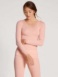 Calida Wełniana koszulka w kolorze koralowym rozmiar: M. Różowe bluzki Calida, m, bez wzorów, z koronki, bez kołnierzyka, bez ramiączek. Za 204.48 zł.