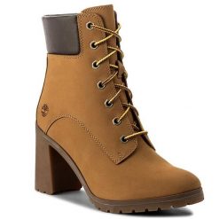 Trzewiki Timberland. Żółte botki Timberland, bez wzorów, bez obcasa, na słupku, bez zapięcia. Za 659.99 zł.