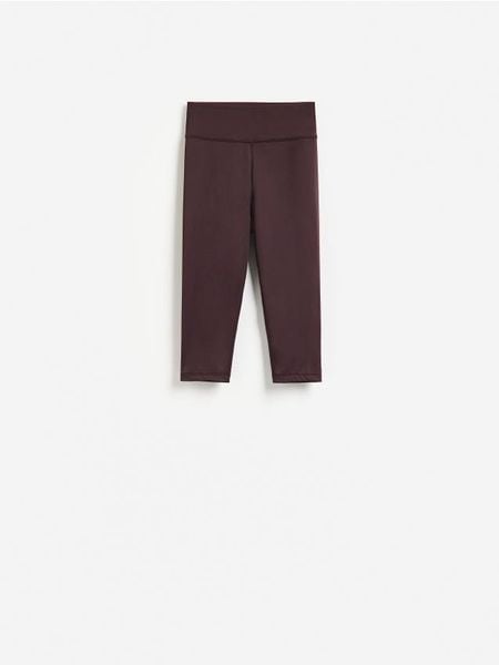 Legginsy capri - ciemnofioletowy. Fioletowe legginsy Reserved, l, bez wzorów, z dzianiny. Za 69.99 zł.