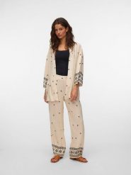 Vero Moda Spodnie w kolorze kremowo-czarnym rozmiar: L. Brązowe spodnie materiałowe Vero Moda, l, bez wzorów, z materiału, z podwyższonym stanem. Za 110.81 zł.