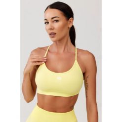 Stanik sportowy bezszwowy Rough Radical Seamless Glow Bra. Żółte bielizna sportowa ROUGH RADICAL, bez wzorów. W wyprzedaży za 103.92 zł.