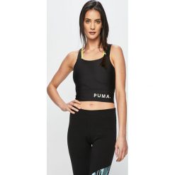 Puma - Top sportowy. Czarne koszulki sportowe Puma, bez wzorów, z elastanu, bez ramiączek. W wyprzedaży za 139.90 zł.