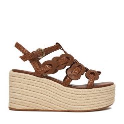 Sandały Badura. Brązowe sandały Badura, bez wzorów, bez obcasa, bez zapięcia. Za 379.99 zł.