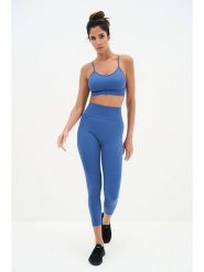 Onamaste Legginsy sportowe w kolorze niebieskim rozmiar: L/XL. Niebieskie legginsy Onamaste, l, bez wzorów, z materiału, z podwyższonym stanem. Za 131.74 zł.