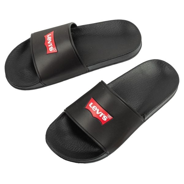 Klapki sportowe damskie laczki Levi's. Czarne klapki Levi's®, bez wzorów, z materiału, bez obcasa. Za 76.99 zł.
