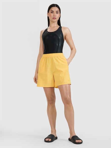 4F Spodenki plażowe damskie - żółte S. Żółte szorty 4f, bez wzorów, z elastanu, wakacyjne. W wyprzedaży za 39.99 zł.