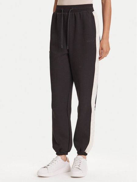 Guess Spodnie dresowe V5YB02 KB3P2 Czarny Regular Fit. Czarne spodnie dresowe Guess, xl, z aplikacjami, z bawełny. Za 229.99 zł.