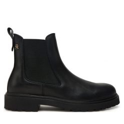 Sztyblety Tommy Hilfiger. Czarne botki TOMMY HILFIGER, bez wzorów, bez obcasa, na płaskiej podeszwie, bez zapięcia. Za 749.99 zł.