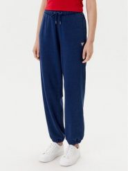 Guess Jeans Spodnie dresowe W5YB65 KCXQ1 Granatowy Regular Fit. Niebieskie spodnie dresowe Guess Jeans, xs, z aplikacjami, z bawełny. Za 389.99 zł.