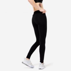 Legginsy fitness damskie Domyos slim. Czarne legginsy DOMYOS, s, bez wzorów, z bawełny. Za 49.99 zł.