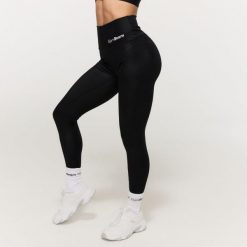 Legginsy damskie fitness z wysokim stanem Prime Black. Czarne legginsy GYMBEAM, l, bez wzorów, z elastanu, z podwyższonym stanem. Za 130.90 zł.