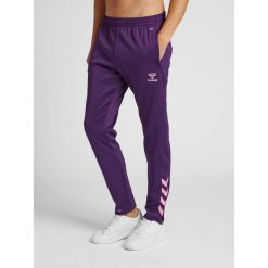 Poliestrowy strój do joggingu Hummel Core XK. Czerwone spodnie dresowe Hummel, m, bez wzorów. Za 203.50 zł.