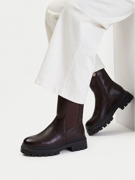 U.S. Polo Assn. Botki EO-SVETA003W/GYE1 Brązowy. Brązowe botki U.S. Polo Assn., bez wzorów, ze skóry, bez obcasa, na płaskiej podeszwie, bez zapięcia. Za 299.99 zł.