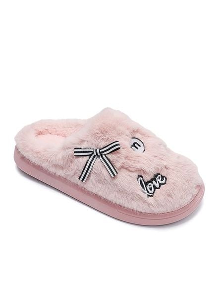 Confly Kapcie w kolorze jasnoróżowym rozmiar: 40/41. Różowe obuwie domowe Confly, bez wzorów, bez zapięcia. Za 47.71 zł.