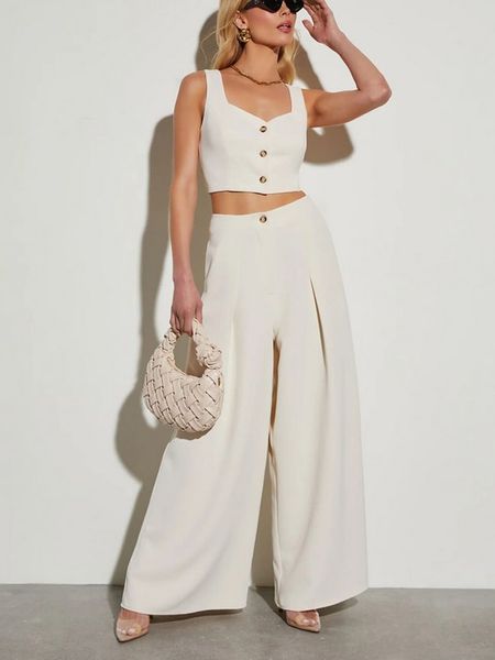 Milan Kiss Spodnie w kolorze kremowym rozmiar: S. Brązowe spodnie materiałowe Milan Kiss, s, bez wzorów, z materiału. Za 135.49 zł.