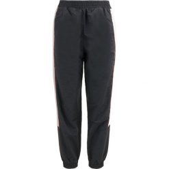 Spodnie Sportowe Damskie XL - Oddychające i Elastyczne na Każdą Okazję. Fioletowe spodnie dresowe Only, xl, bez wzorów. Za 134.99 zł.